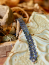 Skythread Tatted Lace Bracelet across raised relief tin tile