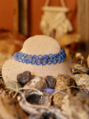 Skyweft tatted lace choker against a bohemian backdrop.