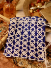 Blue Linen Lace Bag Drawstring lace bag with intricate handmade detail.