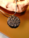 Black clay necklace with silver flecks