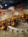 Tatted ember-colored necklace with amber beads