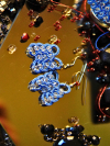 Close-up of blue lace and crystal beads