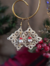 Festive tatted lace earrings featuring pearl beads topped with tiny Santa hats.