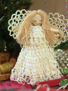 Handmade lace angel with white tatted gown and delicate yarn-hair details