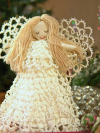 Tatted lace angel with white gown and wings for a Christmas tree top