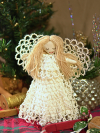 Hand-stitched angel doll with white tatted lace dress and wings