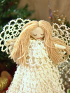 White tatted lace angel tree topper with a full handmade lace gown