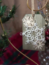 Handmade snowflake tag with tatted lace