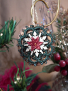 Wood slice ornament with green tatted wreath and red glitter poinsettia