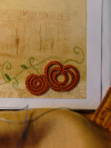 Close-up of tatted lace pumpkin motif