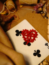 Close-up of handmade red tatted heart on craft table