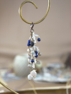 White tatted lace keychain with lapis and crystal beads on vintage book