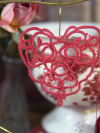 Handmade thread heart photographed for Valentine collection