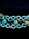 Sea-blue tatted lace necklace with sea-glass, black beads, and ceramic beads.