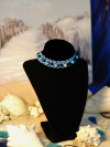 "Tidebound Sentinel" - Ocean's Thread Collection Ocean-inspired lace choker with ceramic accents and Celtic clasp.