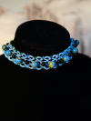 Ocean-blue tatted choker with black, sea-glass, and ceramic beads.