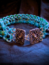 Handmade ocean-inspired tatted lace choker with beads and silver clasp.