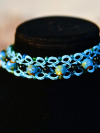 Tatted lace necklace with ceramic, black, and sea-glass beads, Celtic clasp.