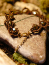 Detailed view of gold-crystal lace bracelet