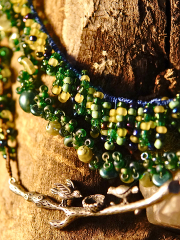 Botanical necklace with layered tatted strands and bird motif