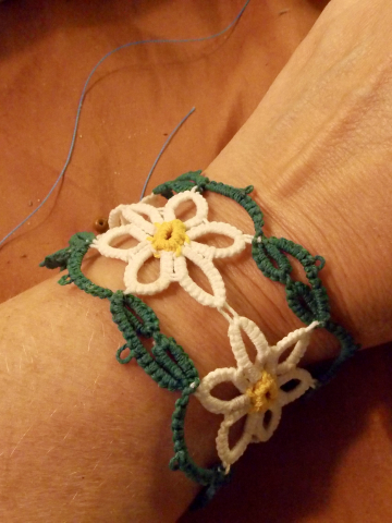 "Daisychain Song" Tatted Lace Bracelet in Morning Light Tatted lace daisy bracelet in green white, and yellow threads