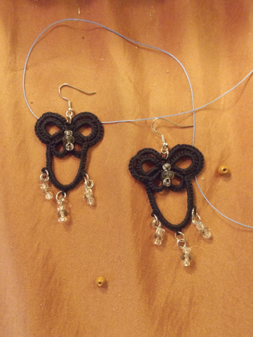 Black lace earrings with looped wings and glass bead drops