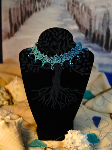Hand-tatted necklace inspired by winter tides and cold seas.