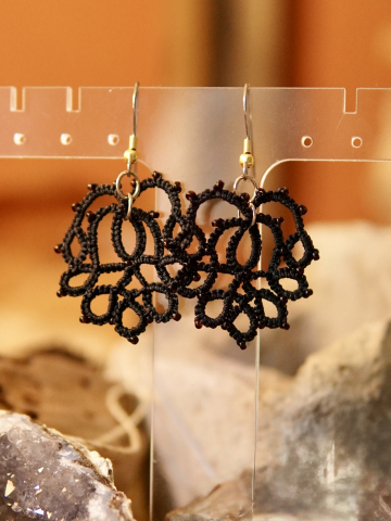 Tatted Lace Earrings shaped like pineapple lace against boho backdrop