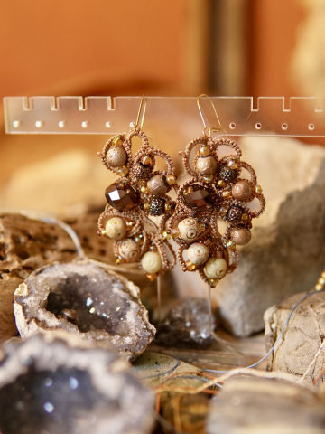 Earth-toned lace earrings with mixed beads and loops.