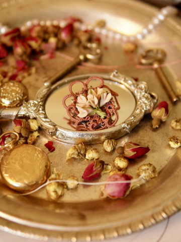 Dusky pink lace pin with ivory flowers in vintage light