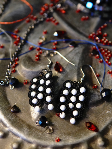 Black tatted earrings with pale stones