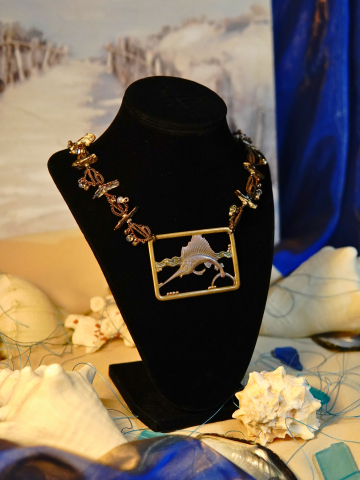 Tatted necklace with brass sailfish and shell accents