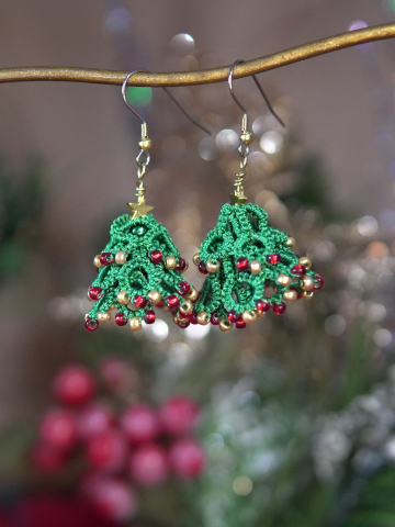 Dimensional lace Christmas tree earrings on gold earring holder