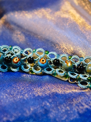 "Tidebound Sentinel" by A Knotted Life Jewelry Sea-blue tatted choker with black glass and sea-glass beads.