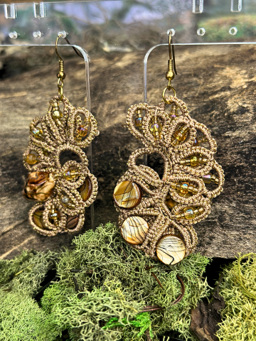 Sunset Glow earrings displayed on moss with driftwood